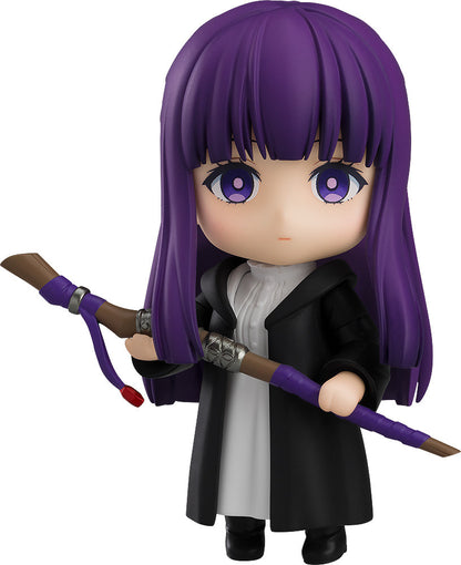 Good Smile Frieren Beyond Journey's End Nendoroid Fern figure with purple hair black coat white shirt holding a brown and purple staff