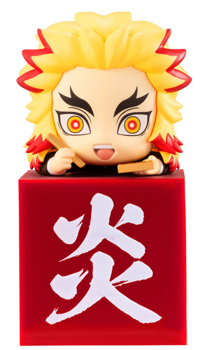 Chibi-style Rengoku Kyojuro figurine from Demon Slayer holding chopsticks on a red base with the kanji for Flame