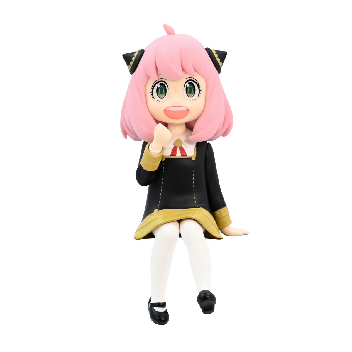 Anya Forger anime figurine from Spy x Family sitting with a happy expression and fist raised