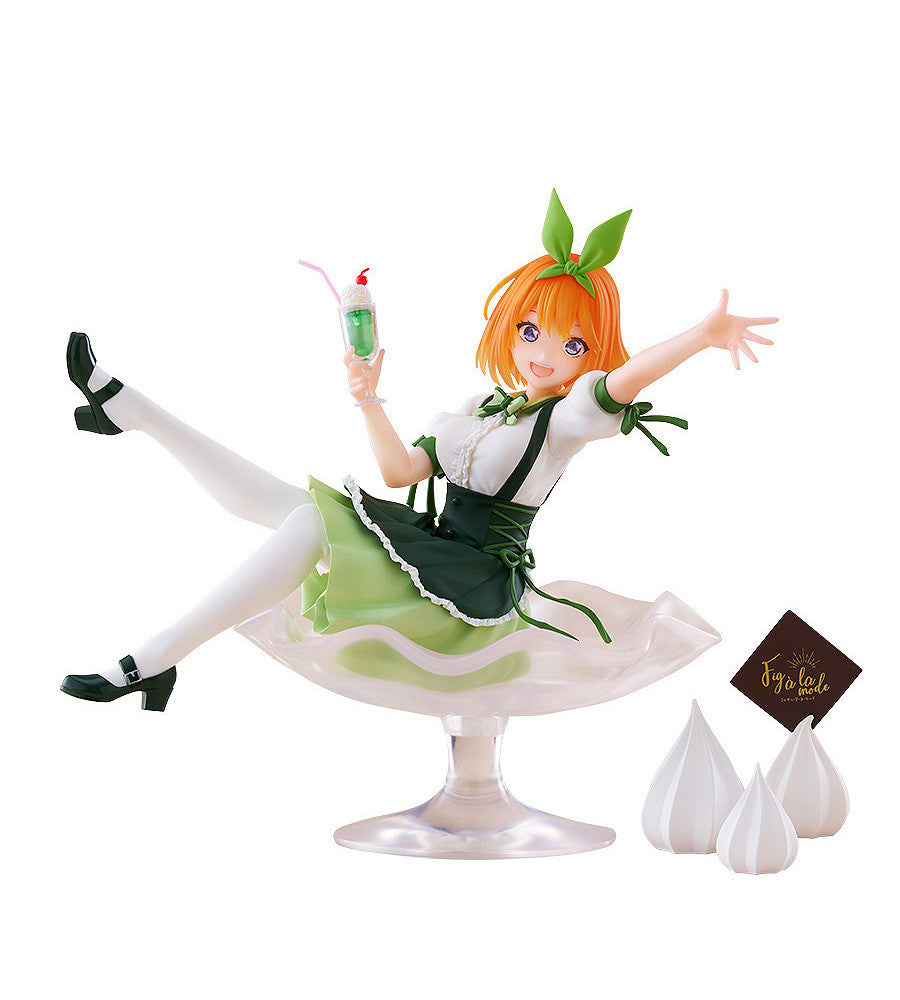 Yotsuba Nakano figure wearing a green and white dress and holding a milkshake sitting in a giant sundae dish on white background