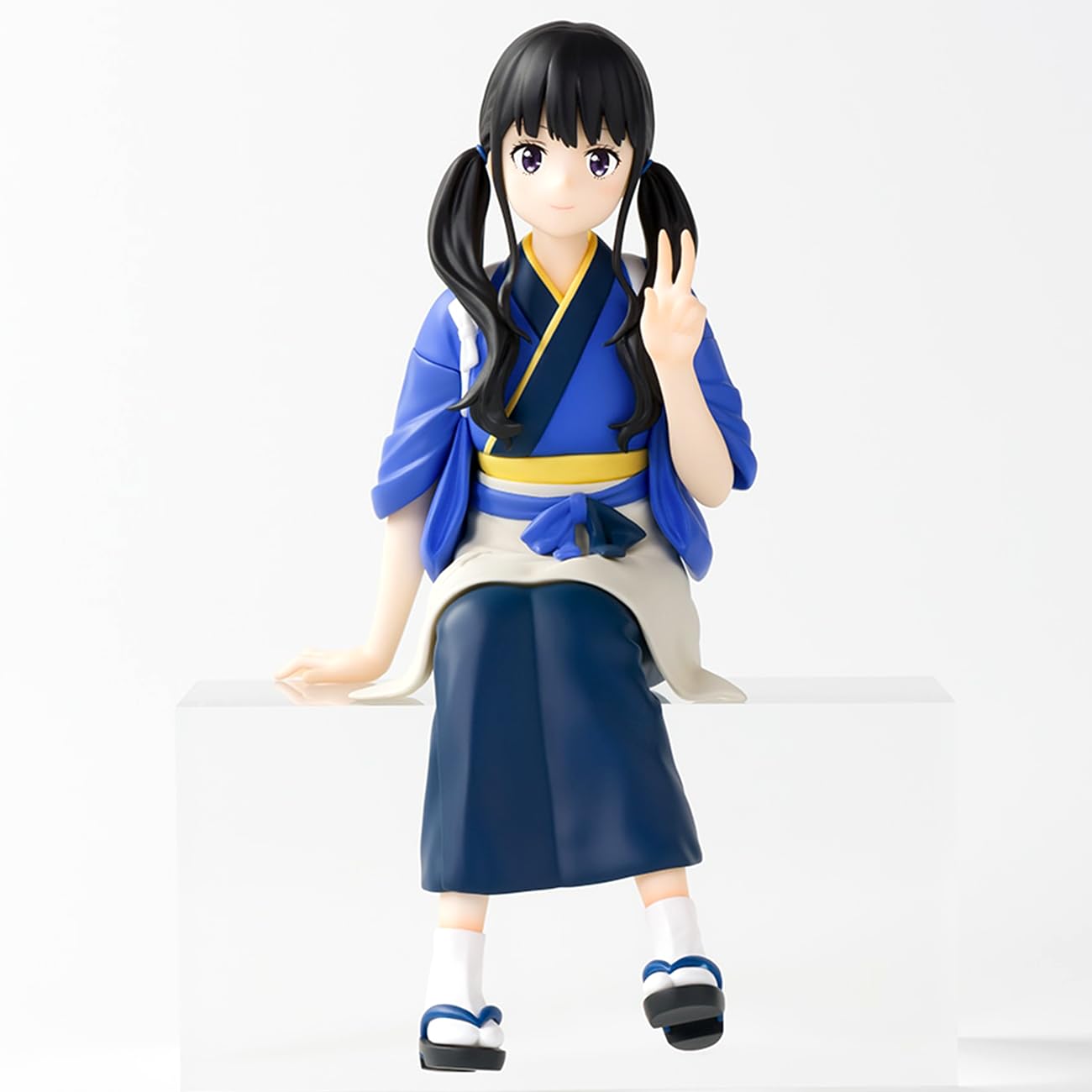 Lycoris Recoil Takina Inoue Perching figure in blue and white outfit posing with two fingers up while sitting