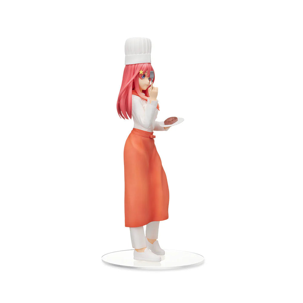 Itsuki Nakano figure from Quintessential Quintuplets wearing a chef hat and orange apron holding a plate with food