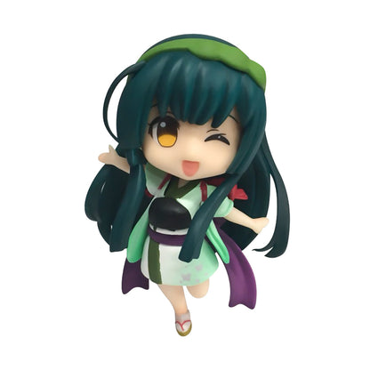 Chibi-style anime girl figurine with teal hair and green headband wearing a light green and white kimono