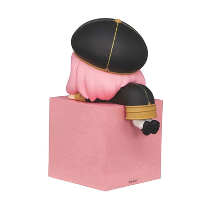 Spy x Family Hikkake Anya Forger figure sitting on a pink box wearing a black uniform cap