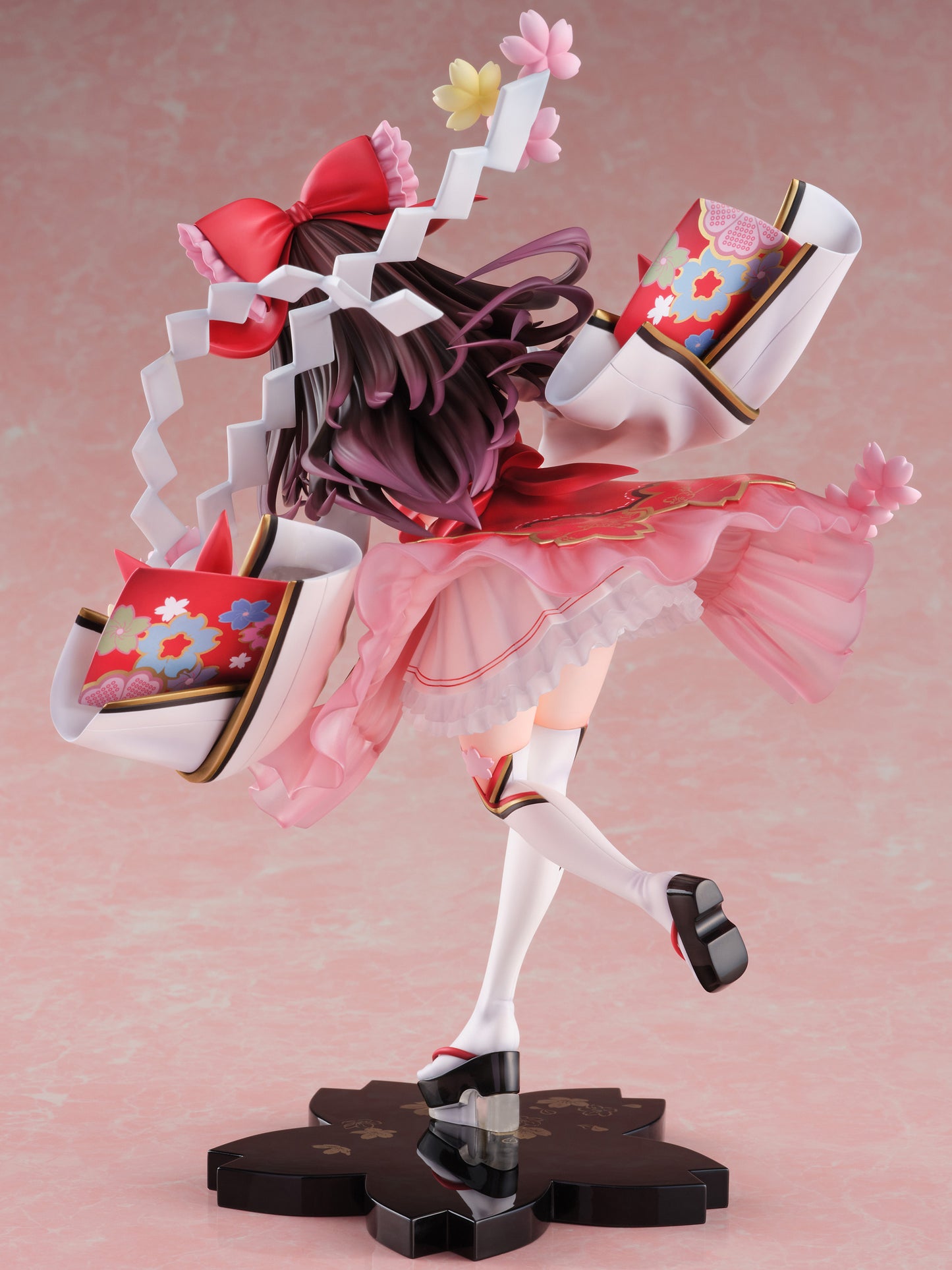 Touhou Project Reimu Hakurei figure by Fuzichoco posed in a dynamic dance red and white outfit with ornate floral details pink and yellow cherry blossoms in hair standing on a dark floral base