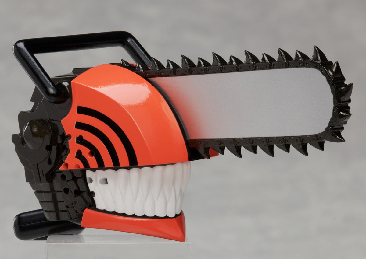 Chainsaw Man miniature figure with orange chainsaw head and black handle