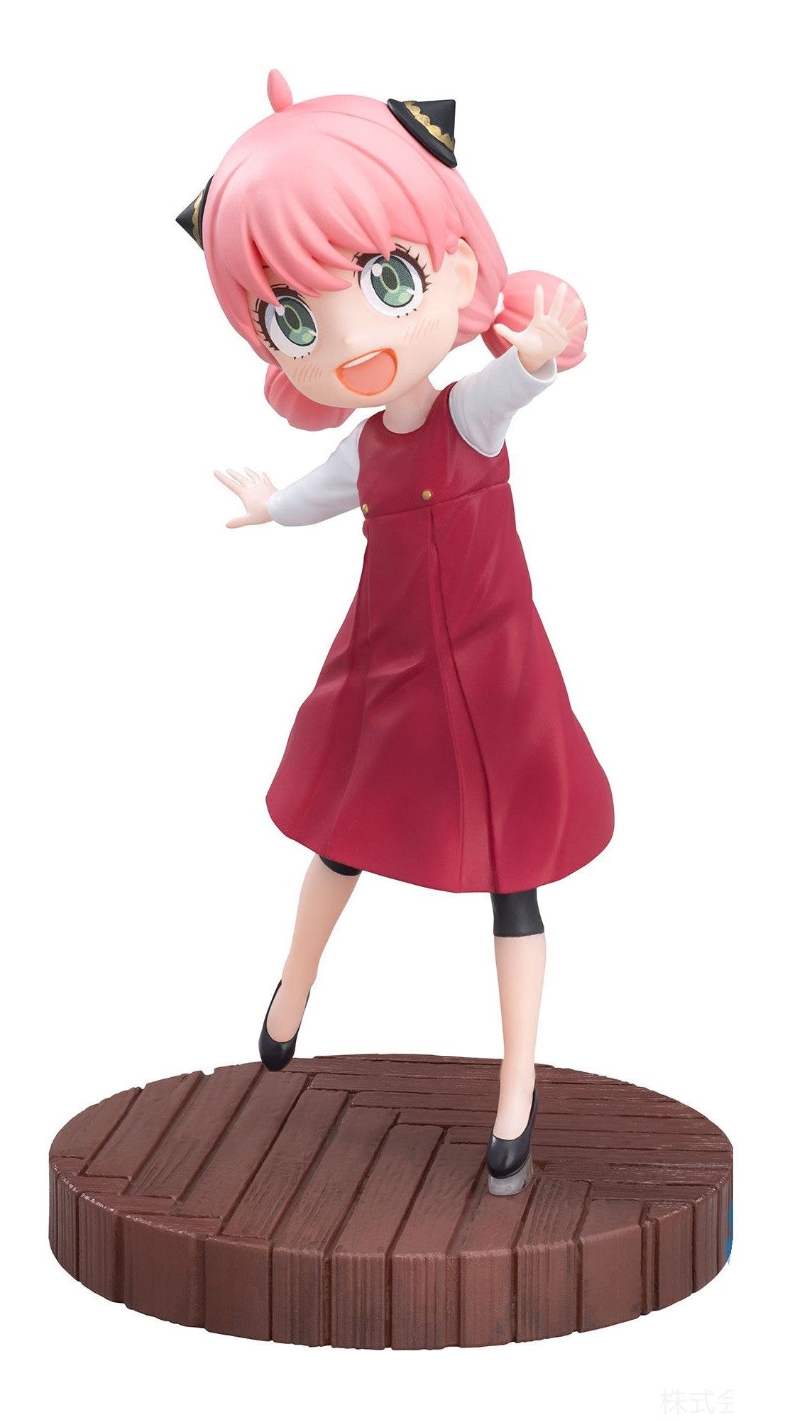 Spy x Family Luminasta TV Anime Anya Forger figure with pink hair and red dress standing on a brown platform