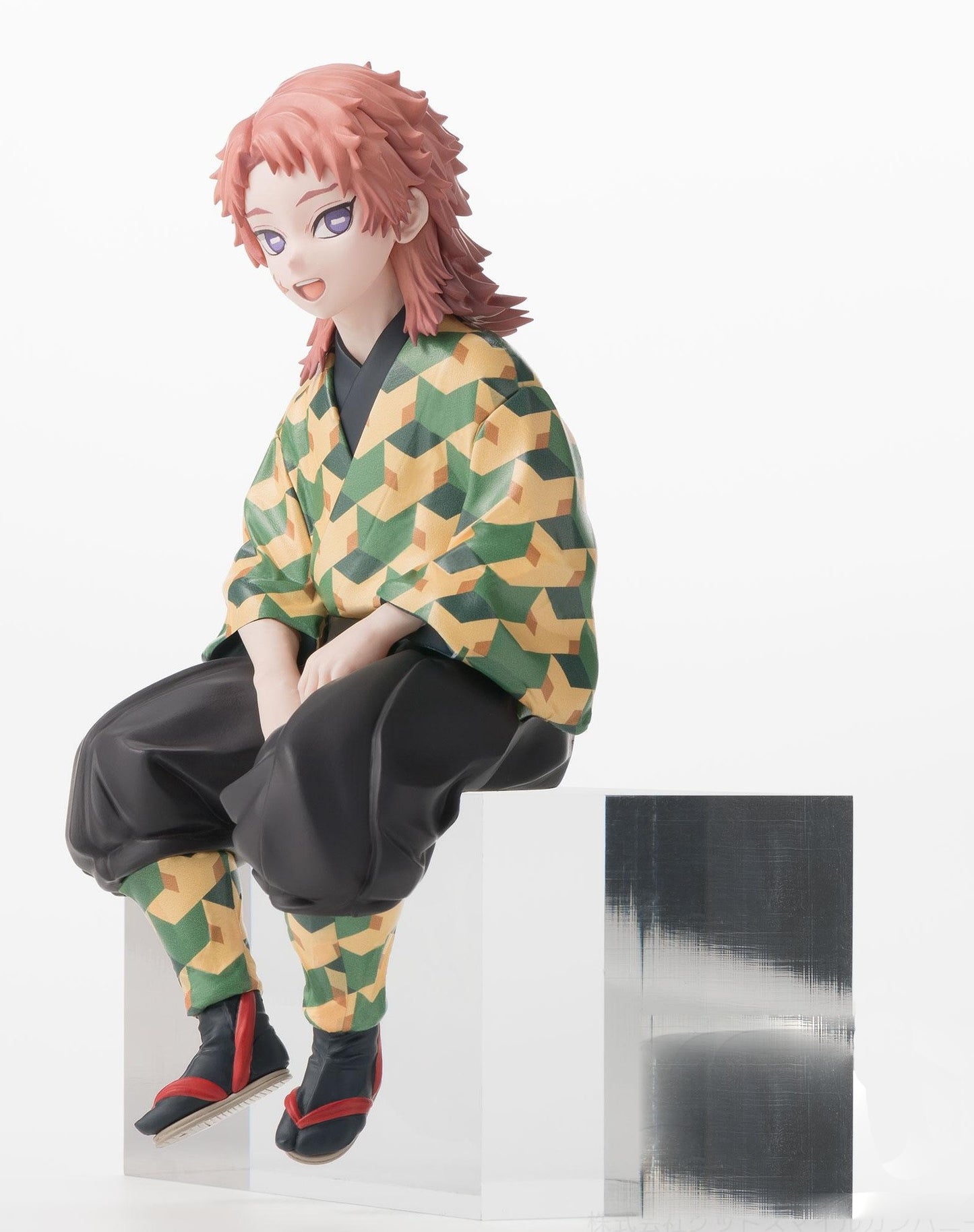 Demon Slayer Kimetsu no Yaiba PM Perching Sabito anime figure in green yellow and dark grey kimono sitting on a block