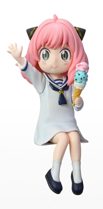 Anya Forger perching on a beach chair in a pink swimsuit, smiling with bright eyes and swim ring beside her