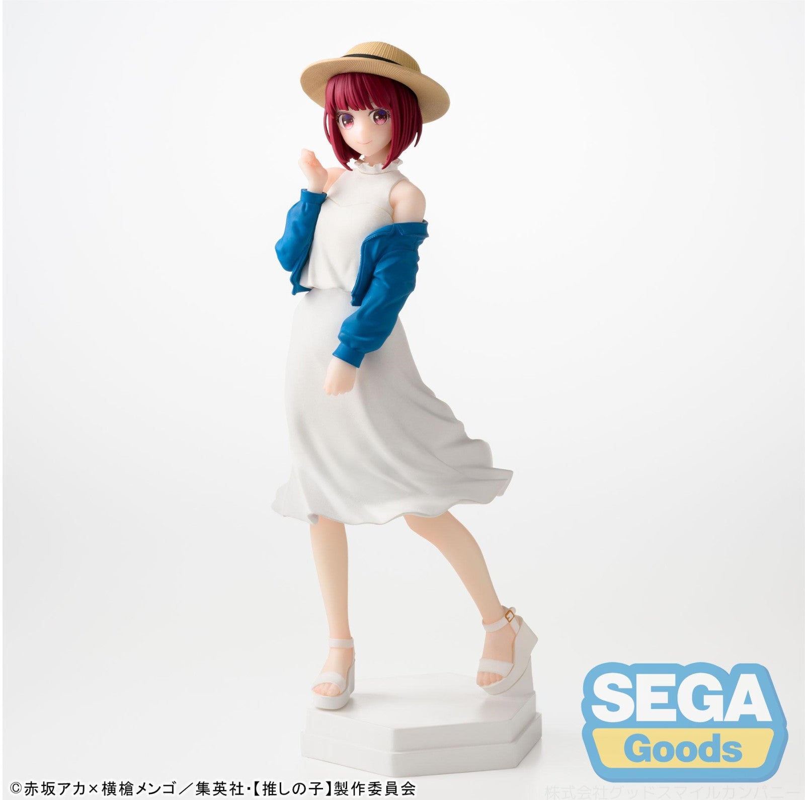 Anime figure of a red-haired girl in a straw hat, white sundress, and blue jacket draped, posing on a white base