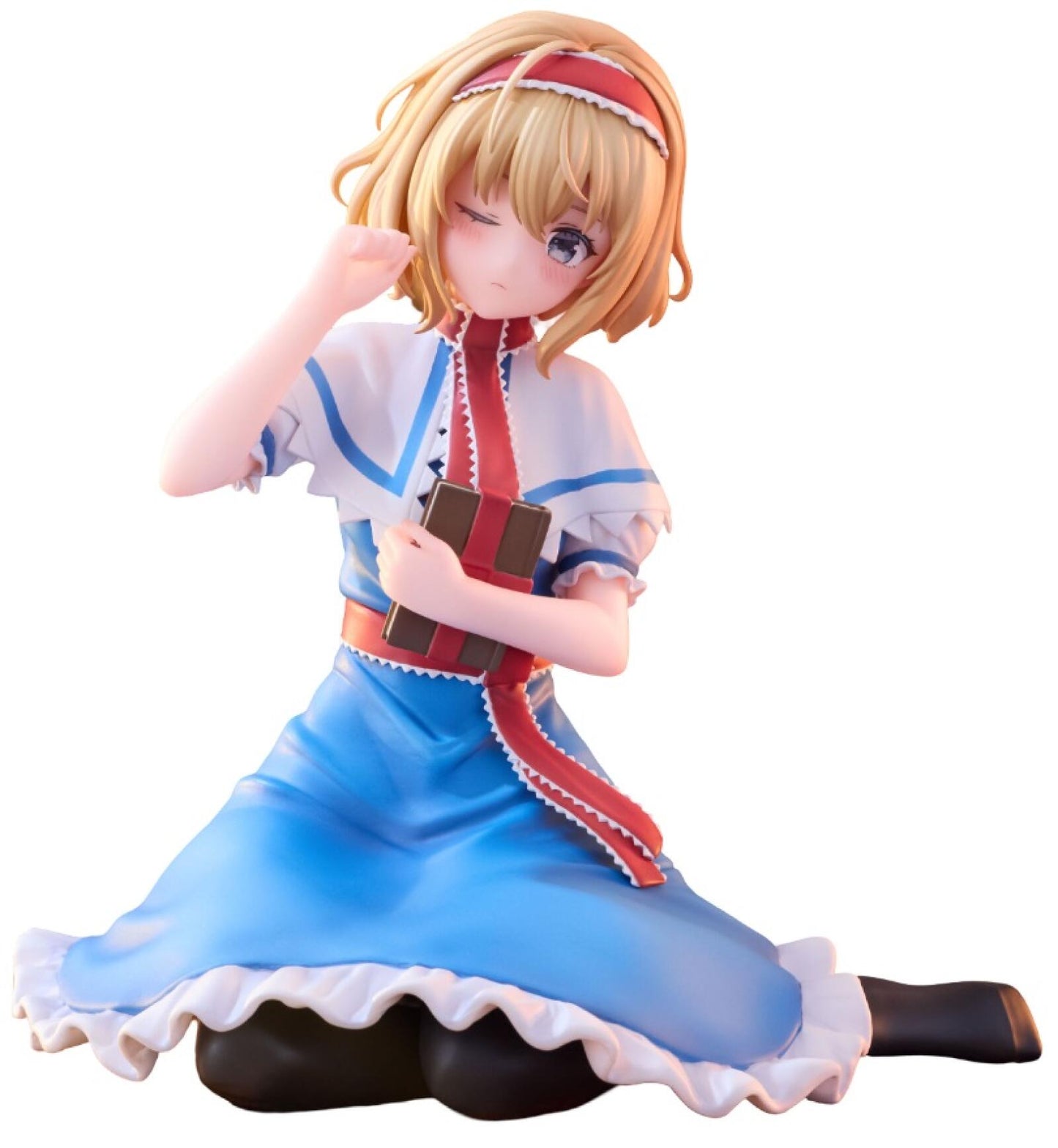 Blonde anime girl figure in blue dress with white top, winking, holding a gift, and sitting with one arm raised.