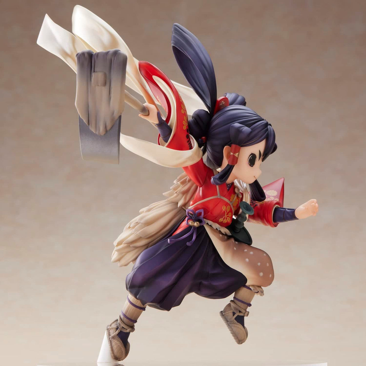 Back view of Sakuna Hime figure showing flowing hair, cape and base