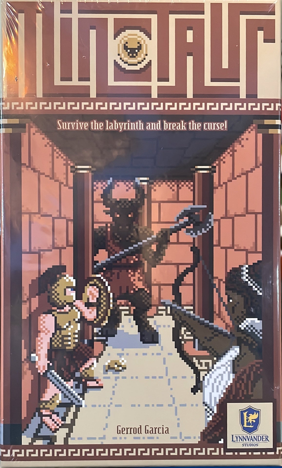 Pixel art cover: MINOTAUR board game. A Minotaur wielding a weapon faces two warriors (sword, bow) in a labyrinth.