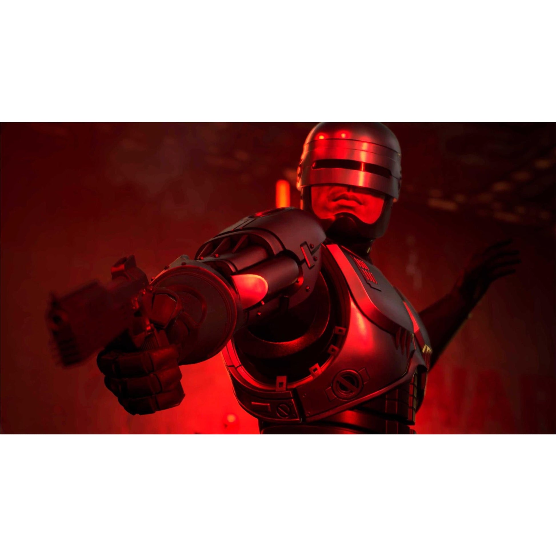 RoboCop in dark armor aims his pistol forward under intense red light