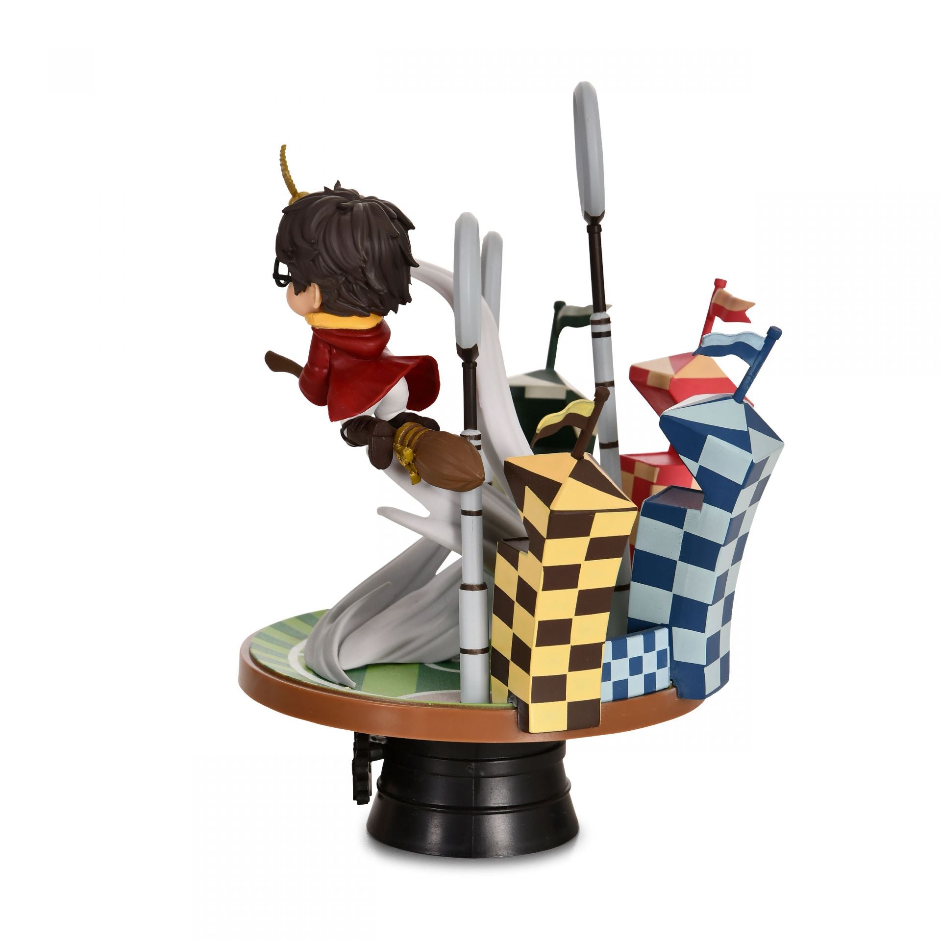 Side view of Harry Potter Quidditch Match figurine mid-air on broom with Quidditch goalpost