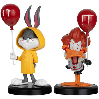 Vinyl figure of Bugs Bunny and Daffy Duck dressed as Pennywise from IT holding a red balloon
