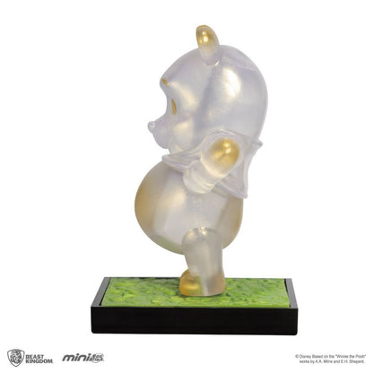 Clear Winnie the Pooh Mini Egg Attack figurine with golden accents standing on a green and black base