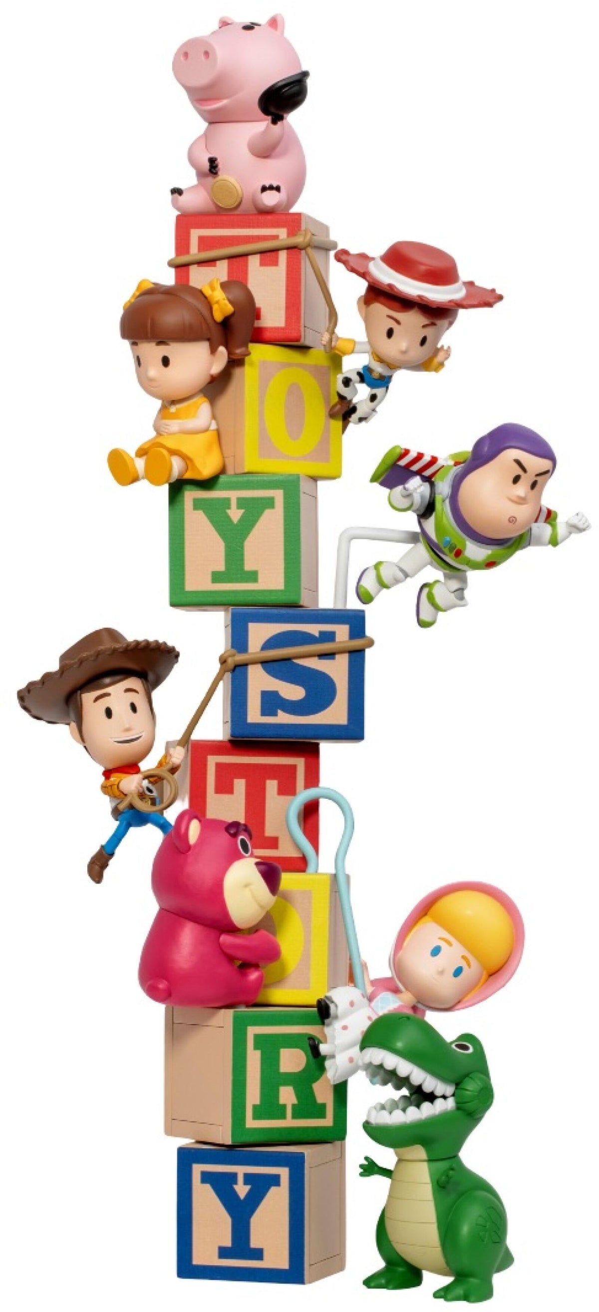Miniature Toy Story characters climb and fly around a stack of colorful blocks spelling &quot;TOY STORY&quot;