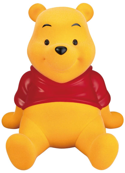 Disney Winnie The Pooh large vinyl piggy bank velvet version shown sitting with a honey pot and two birdhouses