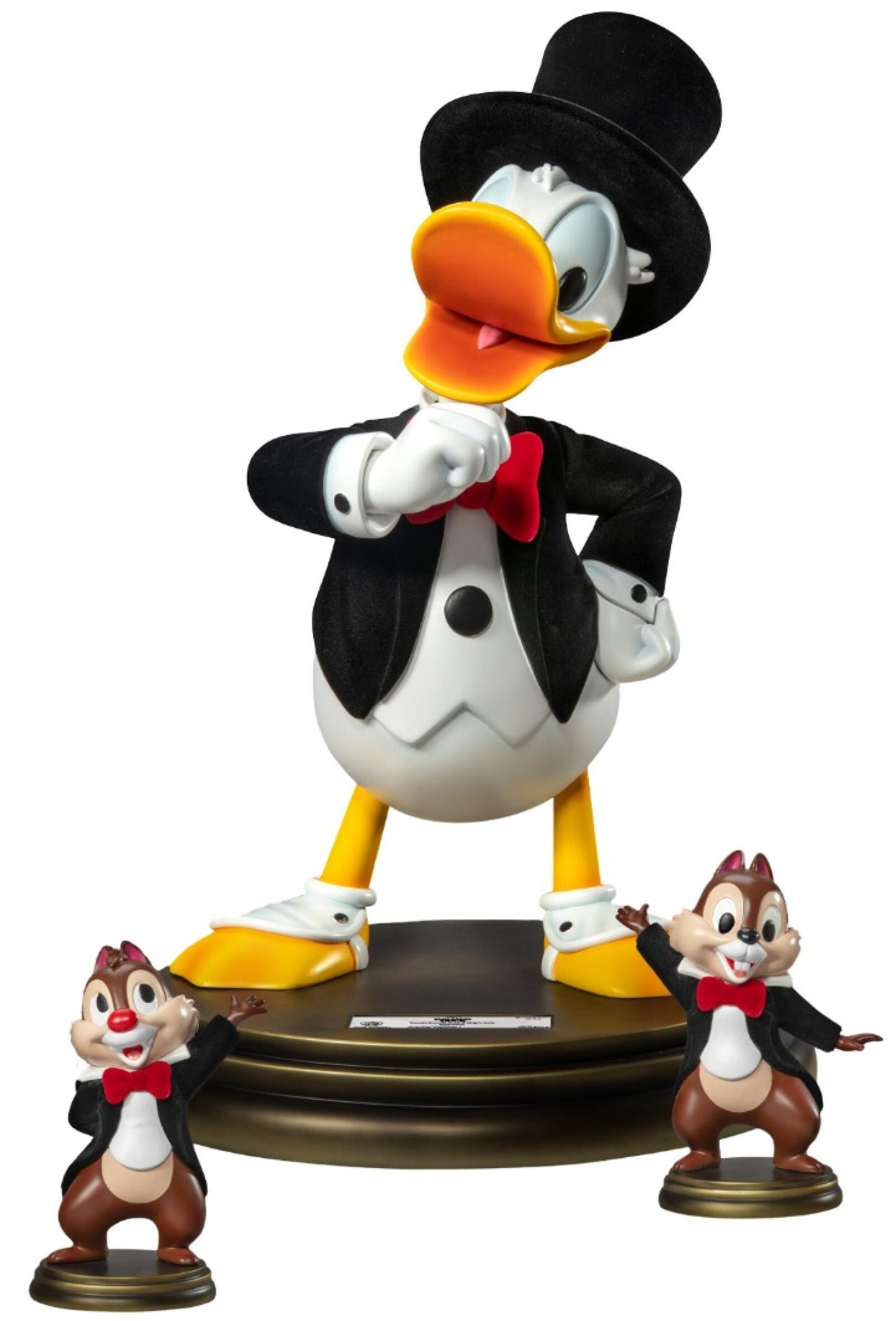 Donald Duck Master Craft statue in a tuxedo with Chip and Dale on a wooden base
