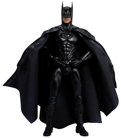 Detailed DAH-116 Batman and Robin action figure in all-black costume with flowing cape standing in a gritty urban setting with background lights