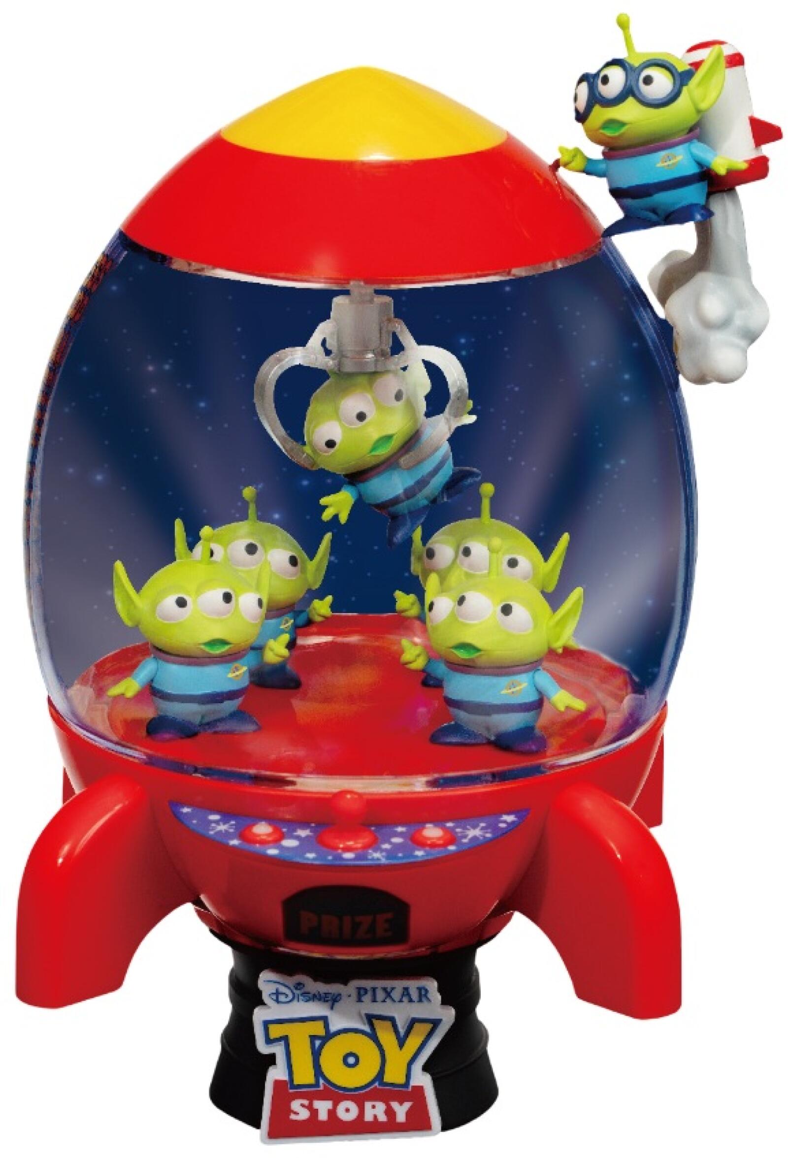 Alien figure inside rocket ship on circular black base