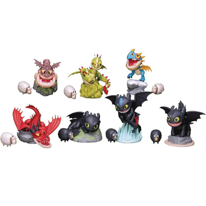 Seven highly stylized How to Train Your Dragon Mini Egg Attack figures including Toothless, Hookfang, and various sheep accessories displayed against white