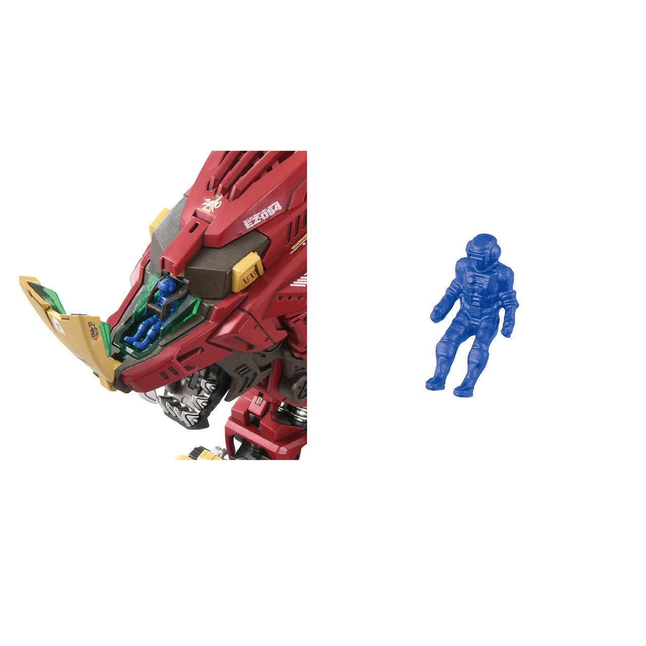 The detailed red Zoids Liger Zero head features an open cockpit revealing a seated blue pilot, with a separate matching blue pilot figurine shown nearby