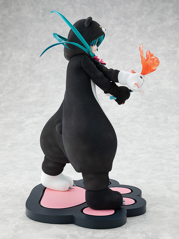 Side view of Yuna figure showing bear gloves and flowing cape detail