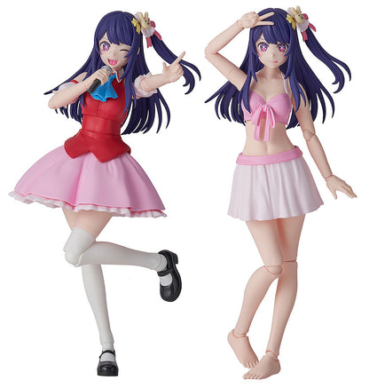 Two anime figures of a purple-haired girl. One winks, singing into a mic in a red and pink idol outfit; the other poses in a pink bikini