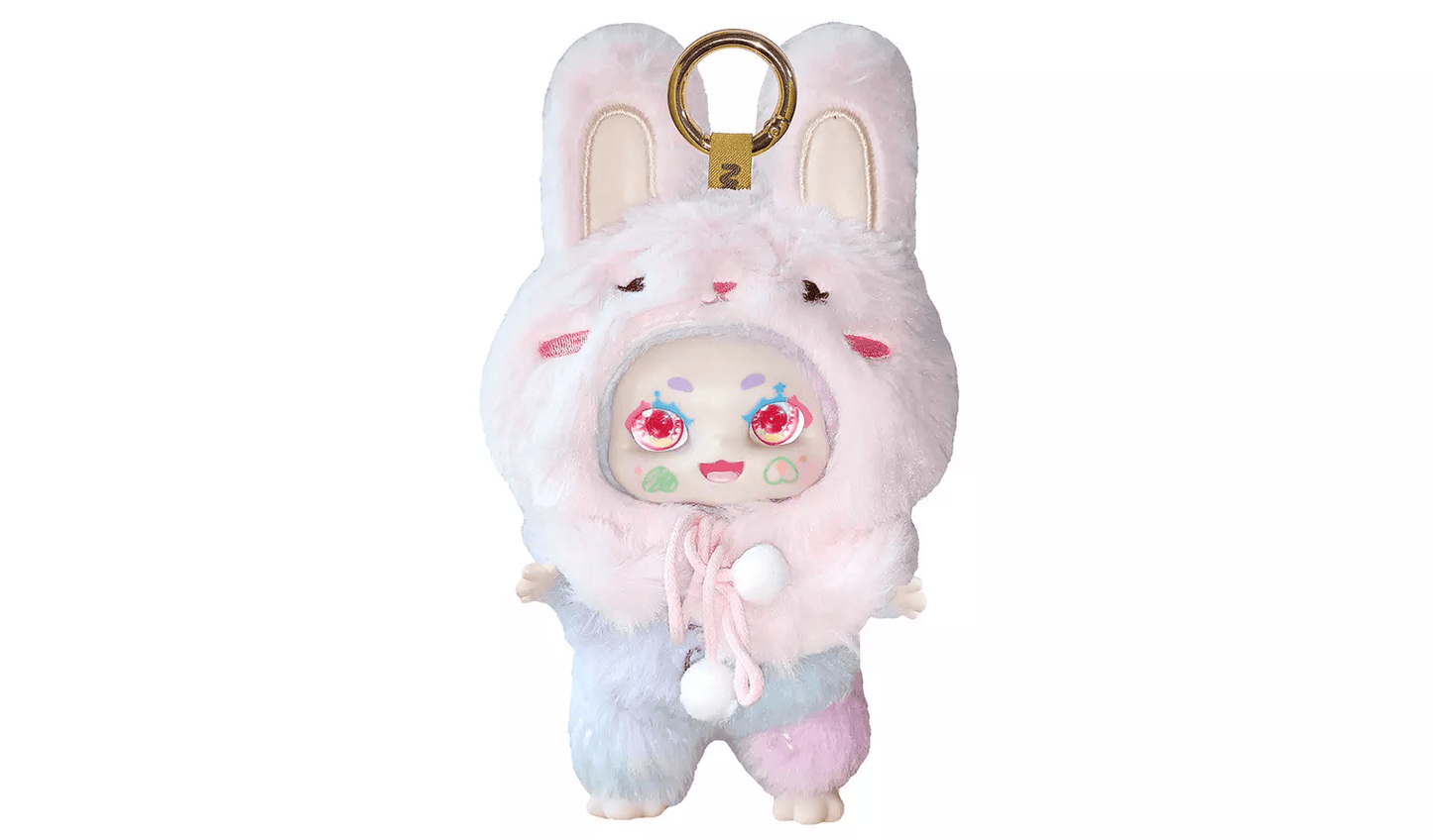 Designer toy keychain: Fluffy doll in a pink bunny suit with large red eyes and pastel blue/pink fur