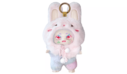 Designer toy keychain: Fluffy doll in a pink bunny suit with large red eyes and pastel blue/pink fur