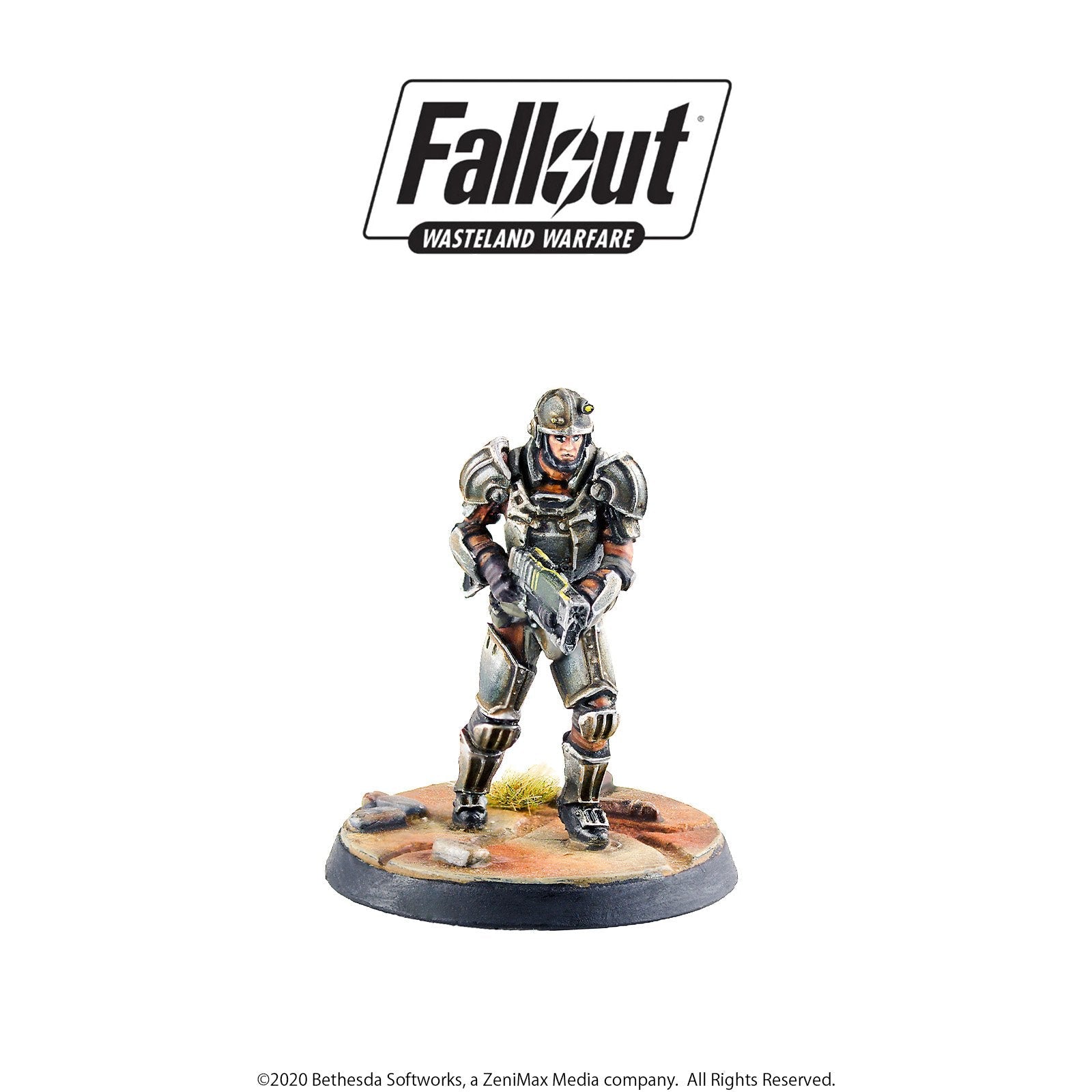 Fallout Wasteland Warfare miniature: Armored soldier in a helmet, holding a rifle, on a rocky terrain base