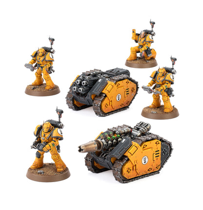 A set of four yellow Legiones Astartes armored miniatures and two yellow and grey tracked Rapier vehicles, one with quad barrels and one with a single large cannon