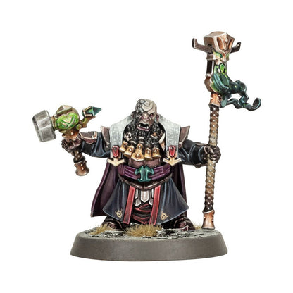 The Helsmiths Of Hashut Daemonsmith miniature features a dwarf in dark armor and robes, wielding a glowing magic hammer and a tall decorative staff