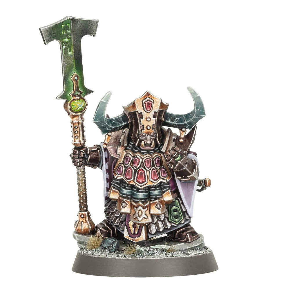 Miniature of the Helsmiths Of Hashut War Despot wearing ornate copper and red armor, wielding a tall staff with a glowing green battle axe head