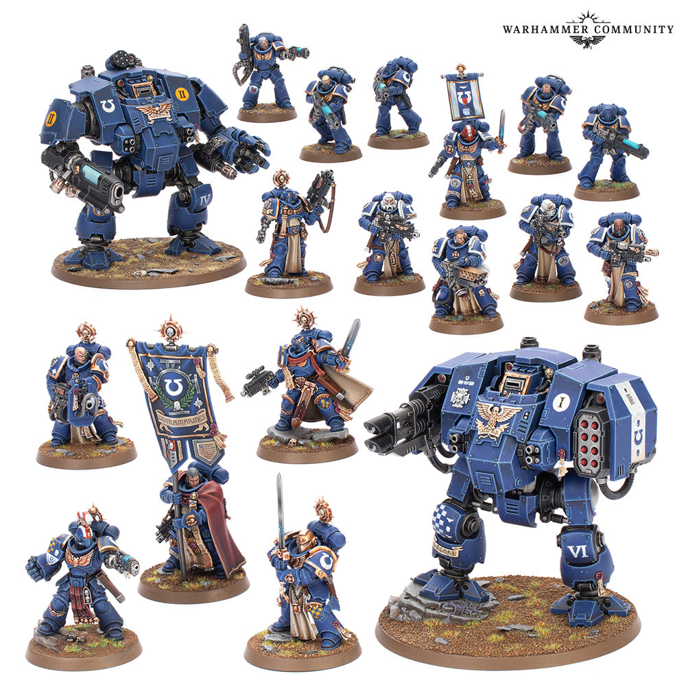 This detailed product image shows the Warhammer 40k Space Marines Iron Halo Strike Force collection featuring two Dreadnoughts and fifteen blue Ultramarines infantry