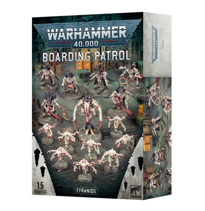 Retail box for Warhammer 40,000 Boarding Patrol Tyranids containing 15 miniatures displayed against a metallic floor backdrop