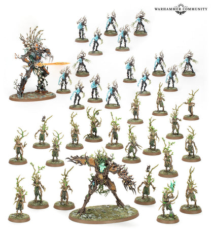 A massive Sylvaneth Outcast Spitegrove collection displaying dozens of painted tree-kin miniatures two large treelords and numerous smaller dryads and spite