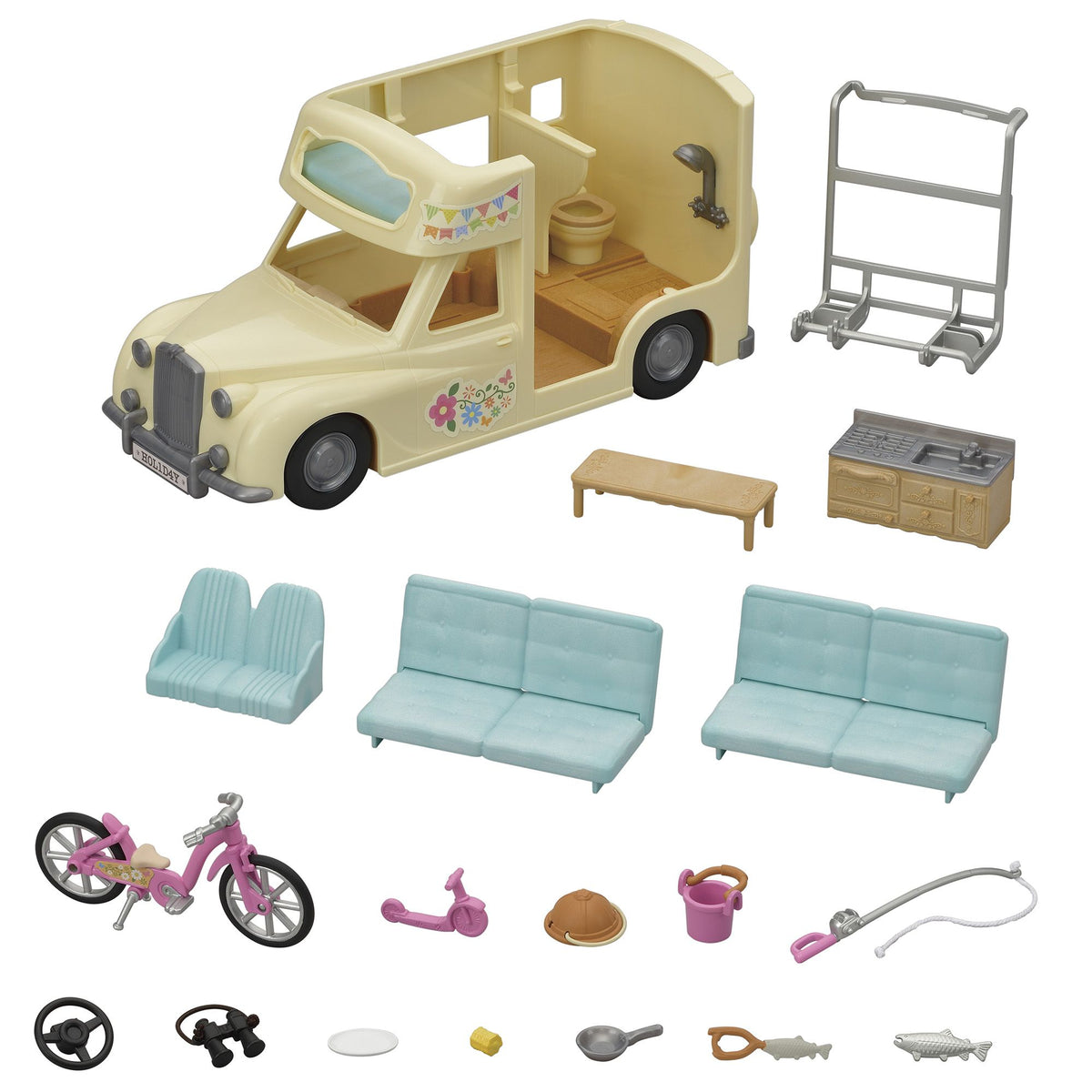 Cream vintage camper van toy playset disassembled, showing furniture, bicycle, kitchen, fishing rod, and small accessories