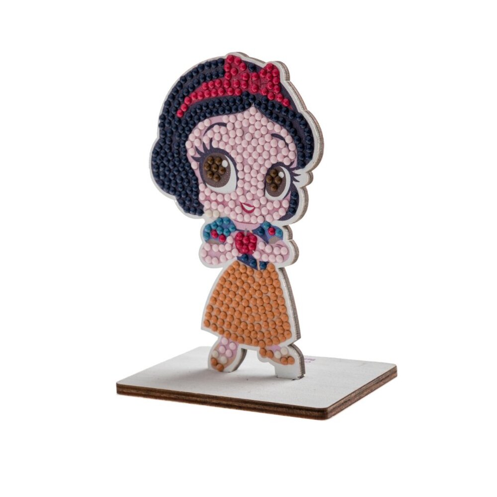Detailed image of the completed Snow White CrystalArt Buddies figure, showcasing the character made of tiny colored beads standing on a small rectangular base