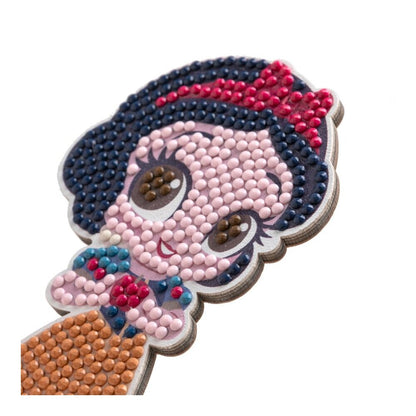 The completed Crystal Art Buddies figure of Snow White, rendered in small round adhesive gems displaying her iconic cartoon face and layered wooden edges