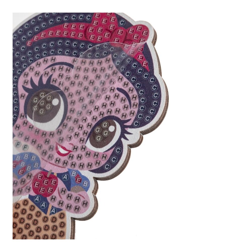 Unfinished Snow White CrystalArt Buddies diamond painting base with printed placement codes and a clear protective sheet visible over the adhesive surface