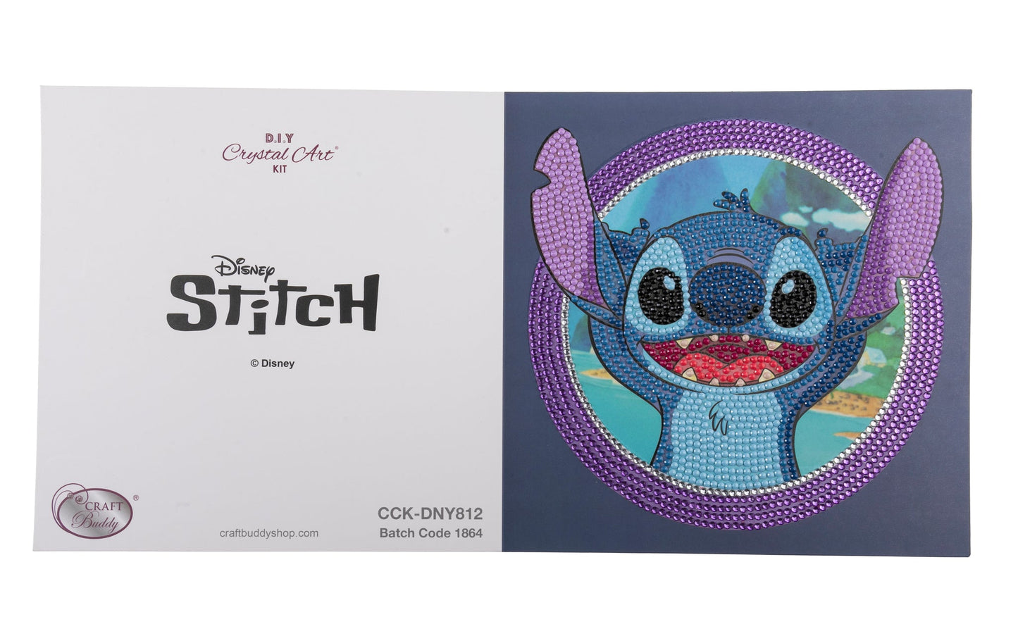 Craft Buddy's DIY Crystal Art Stitch card kit displays a vibrant rhinestone mosaic of the grinning blue alien inside a thick purple crystal border