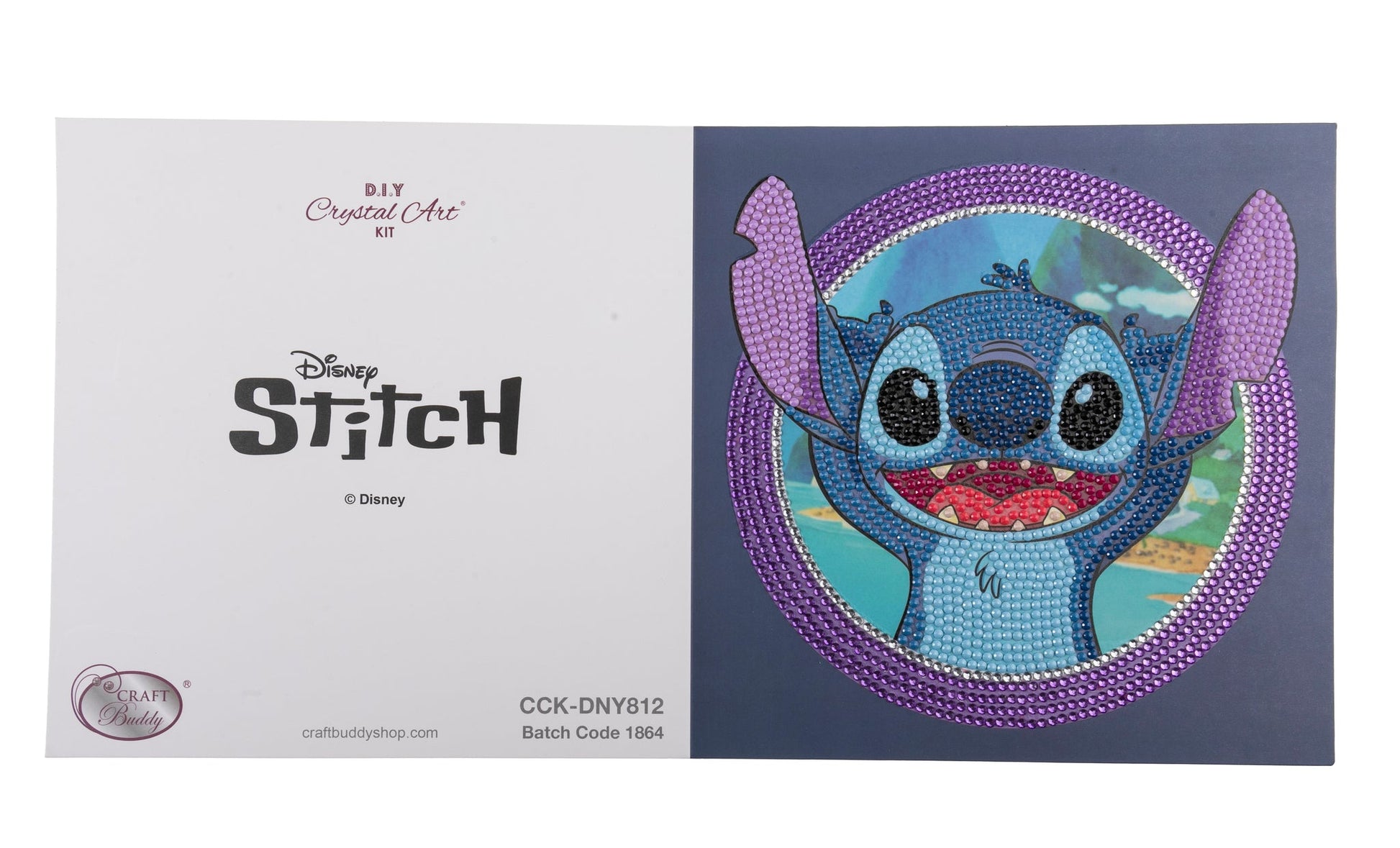 Craft Buddy's DIY Crystal Art Stitch card kit displays a vibrant rhinestone mosaic of the grinning blue alien inside a thick purple crystal border