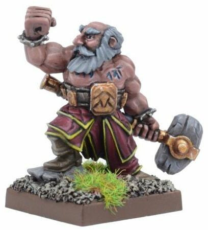 Image showing miniature holding a hammer and wearing stone-themed armor
