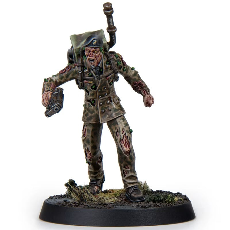 Miniature of an undead soldier/ghoul in a camo uniform, beret, and backpack, holding a device
