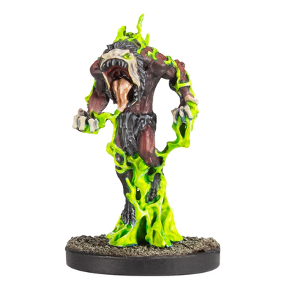 A Deadzone miniature of a monstrous figure with an open mouth, long tongue, and glowing green energy erupting from its body