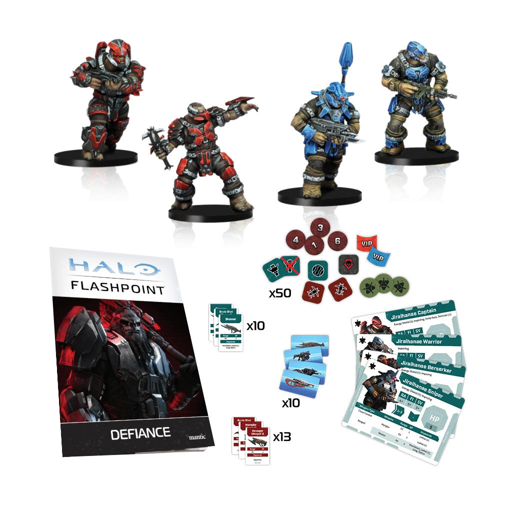 Four painted Halo Jiralhanae miniatures in red and blue armor are displayed alongside the Defiance booklet, unit cards, and dozens of game tokens