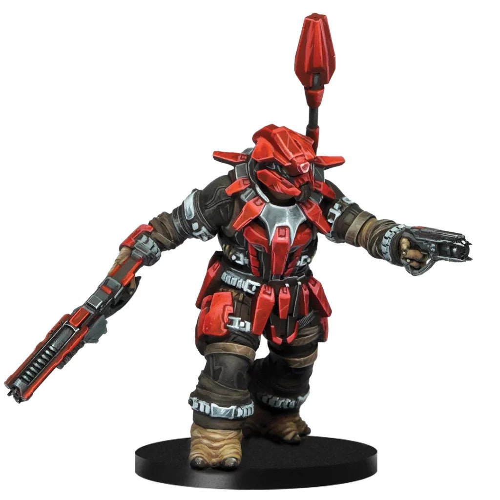 Painted Halo Brute miniature in red and black armor holding a heavy weapon and a pistol on a round display base